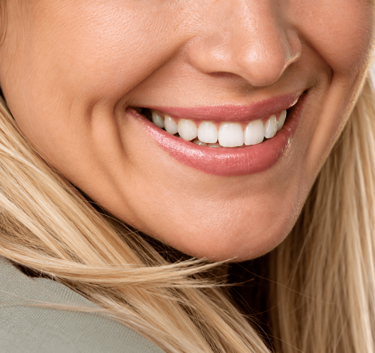 Smiling woman with natural cheek dimples