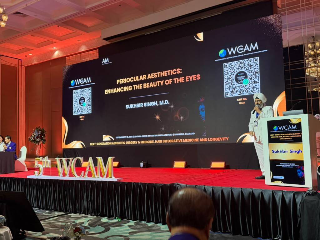 dr-sukhbir-singh-wcam-stage-presentation-trichology